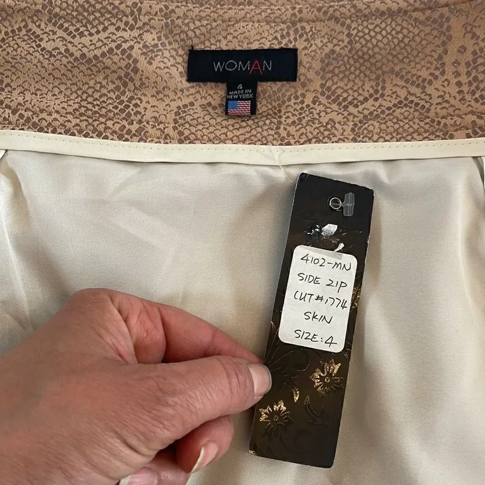 WOMAN BRAND SNAKE PRINT MACHINE WASHABLE MINI SKIRT.  NEW WITH TAGS